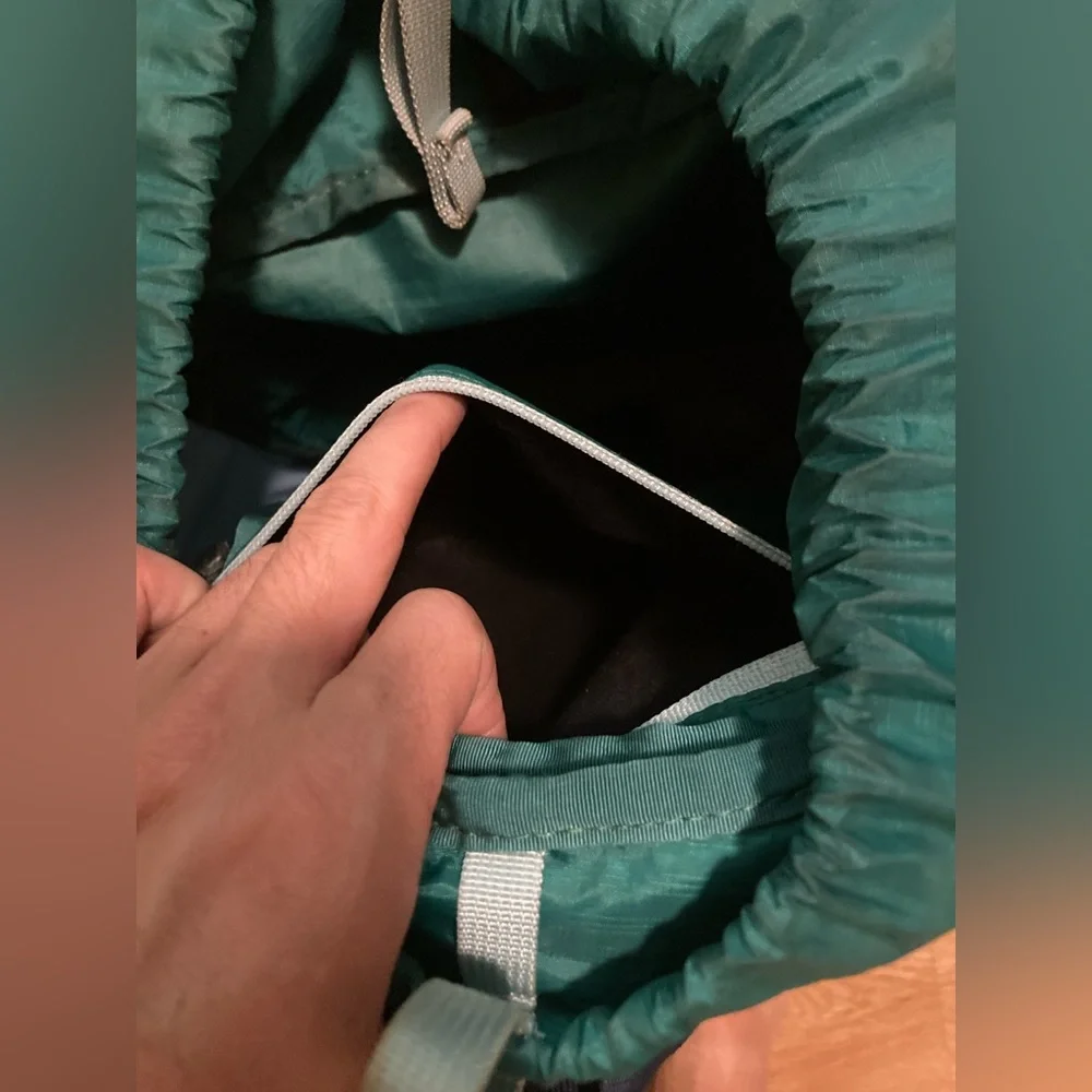 cotopaxi navy blue light blue green striped backpack